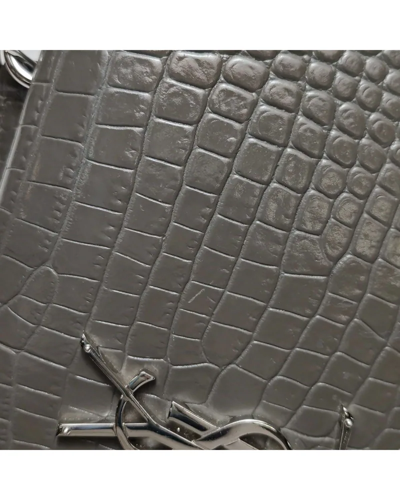 Saint Laurent Sunset, Croc-Embossed, close up light marks on the body and the front