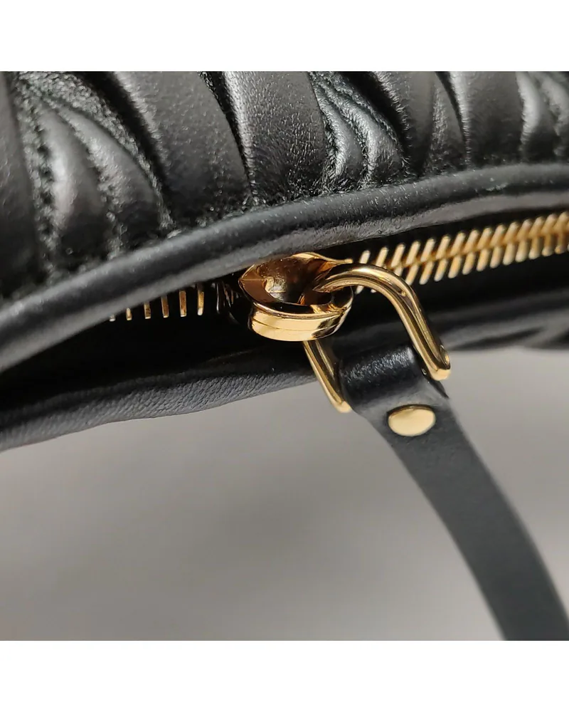 Miu Miu Wander Small, close up light wear on the hardware
