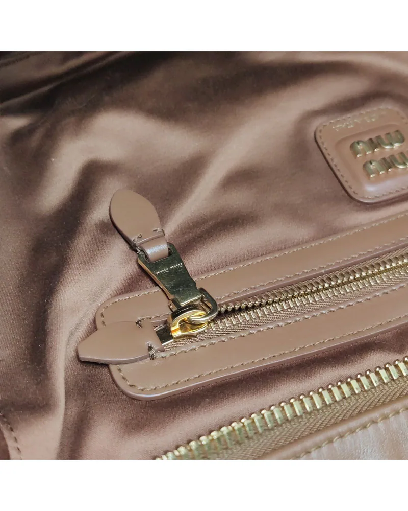 Miu Miu Beau Large, close up light wear on the hardware