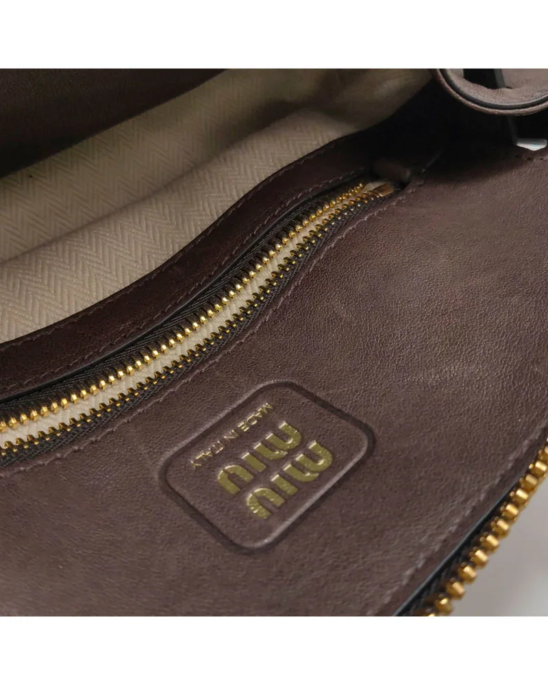 Miu Miu Aventure, close up light scratches on the lining