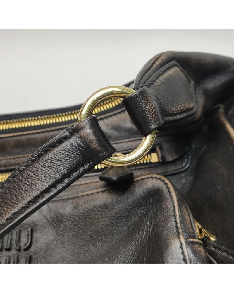 Miu Miu Pocket, close up light wear on the hardware