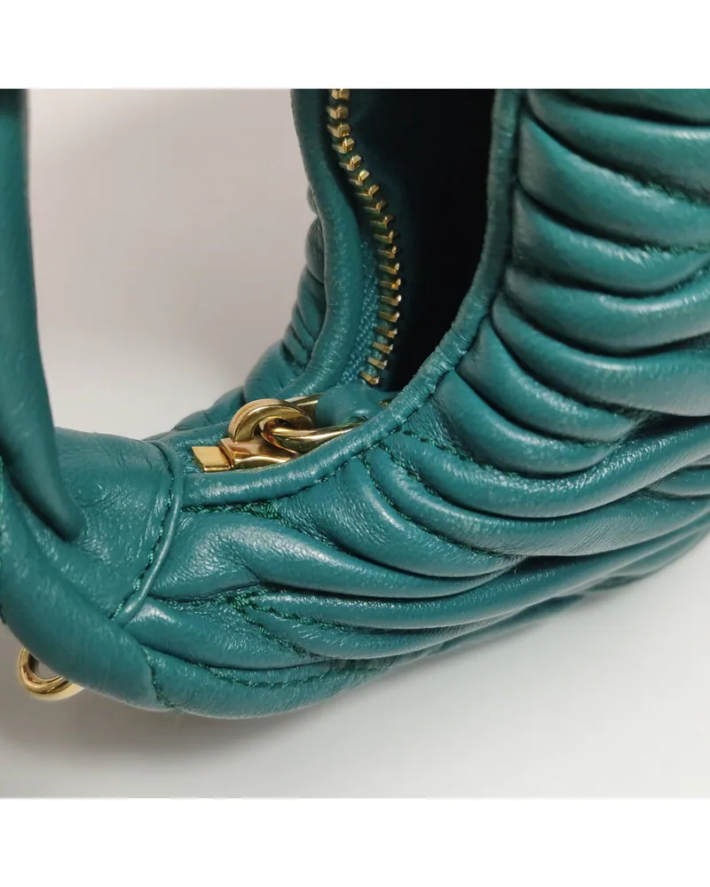 Miu Miu Wander, close up light wear on the hardware