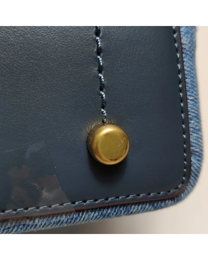 Coach Willow Bucket 24, close up light wear on the base studs