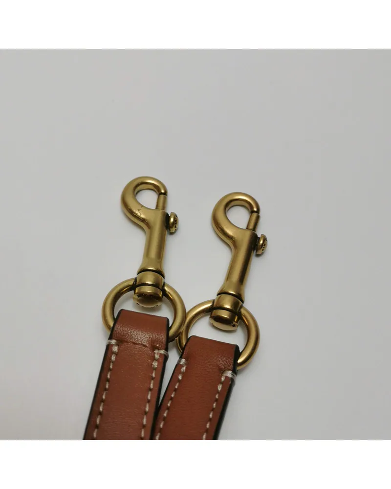 Coach Swinger, Tom Wesselmann Collaboration, close up moderate wear on the hardware