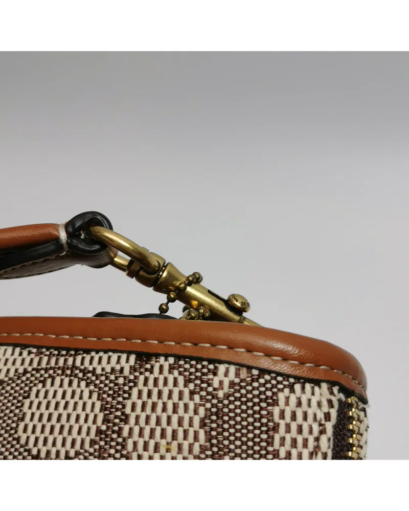 Coach Swinger, Tom Wesselmann Collaboration, close up moderate wear on the hardware