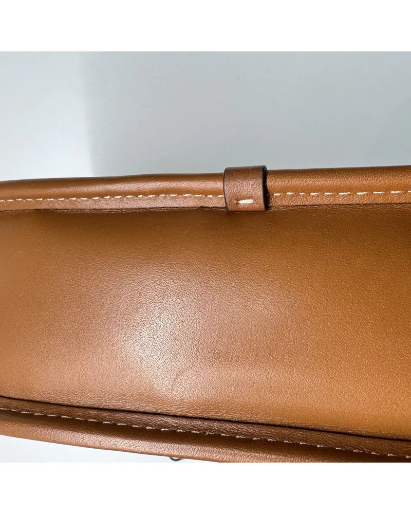Coach Swinger, Tom Wesselmann Collaboration, close up light wear on the body