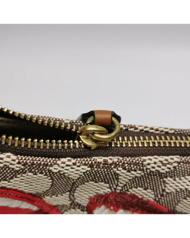 Coach Swinger, Tom Wesselmann Collaboration, close up moderate wear on the hardware