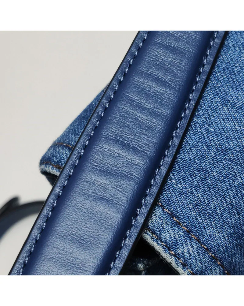 Coach Cassie, close up light wrinkles on the handle