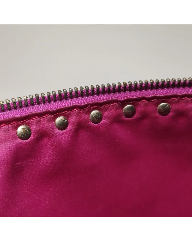 Valentino Rockstud Clutch, close up light wear on the lining