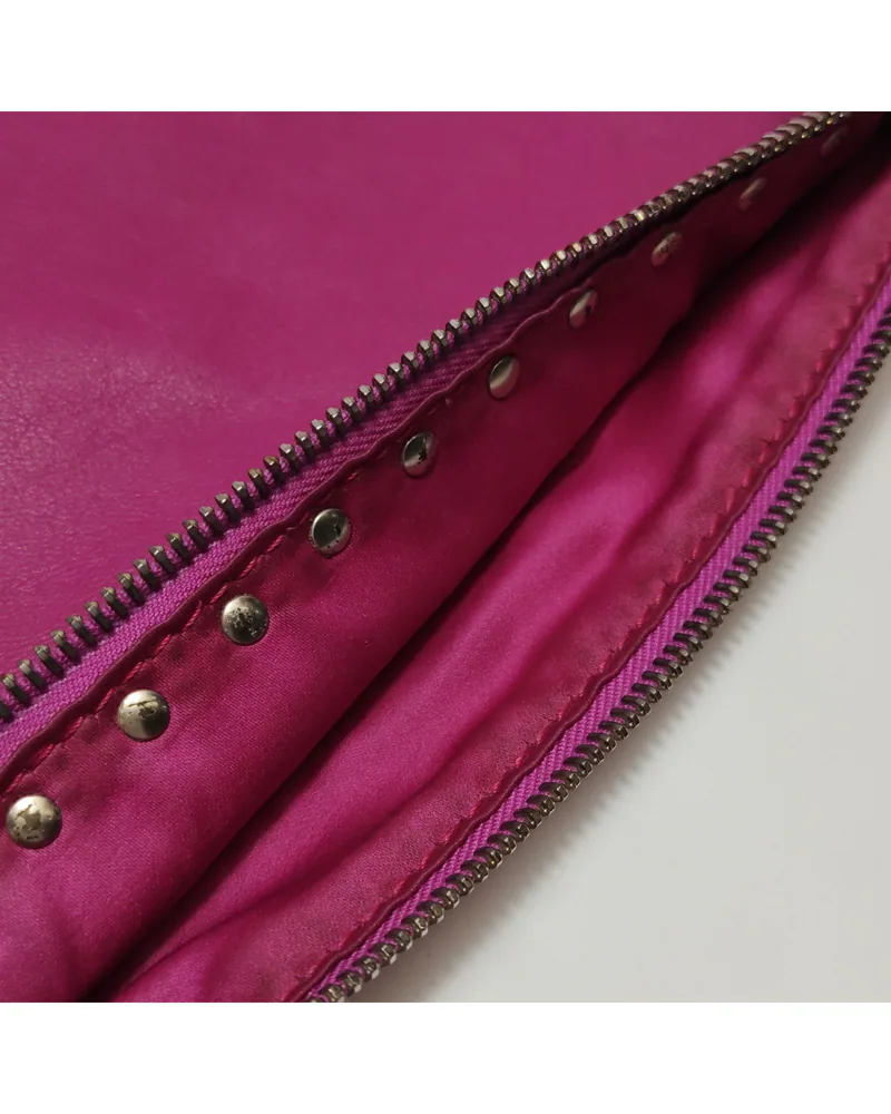 Valentino Rockstud Clutch, close up moderate marks on the lining