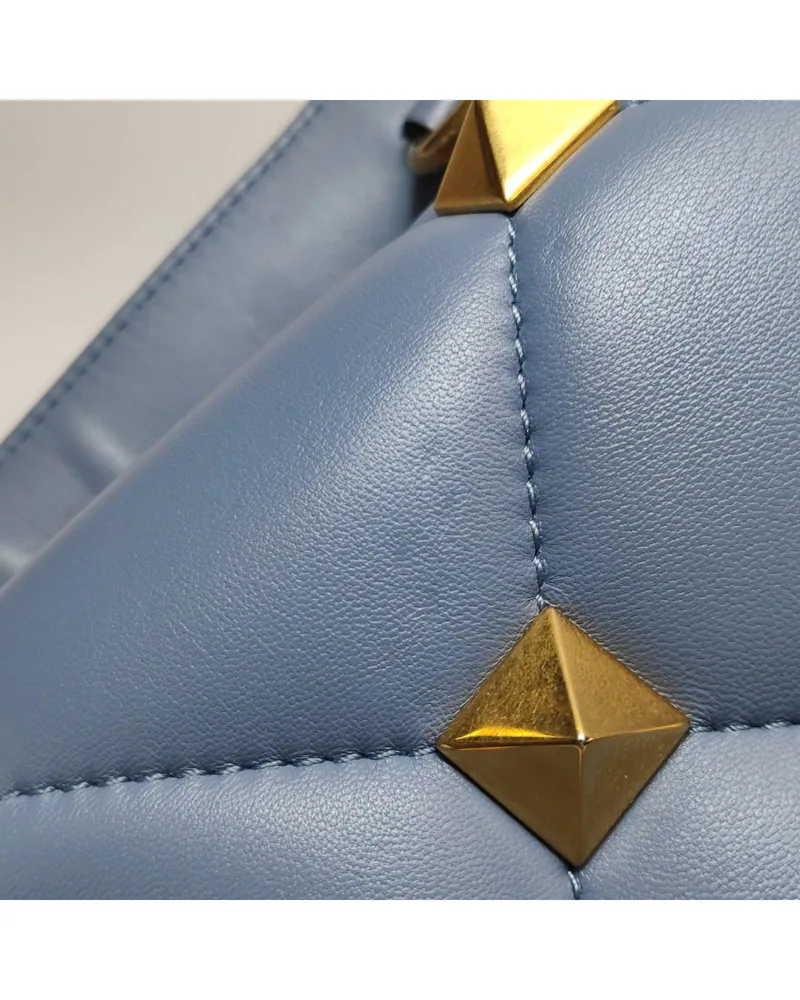 Valentino Roman Stud, close up light pressure marks on the body and the back
