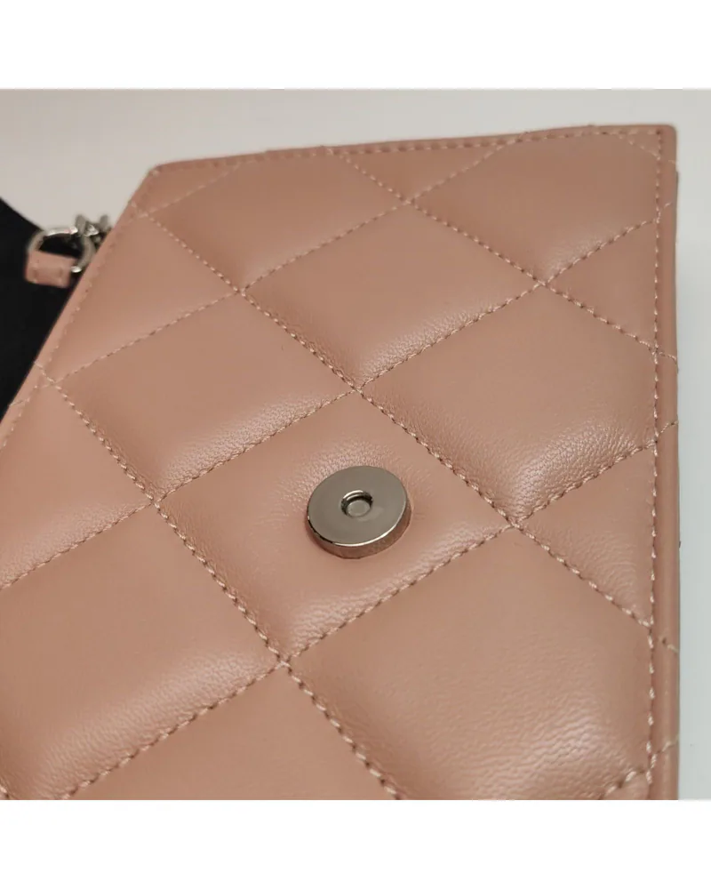 Alexander McQueen Skull Crossbody, close up light wear on the hardware