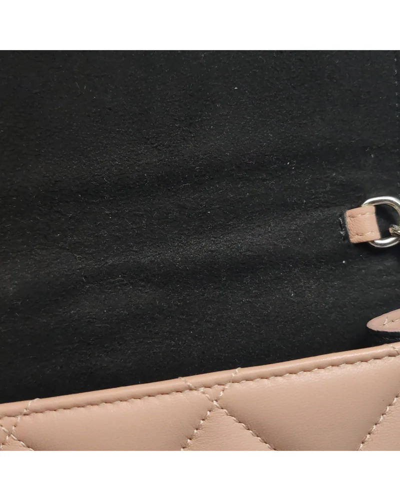 Alexander McQueen Skull Crossbody, close up light marks on the lining