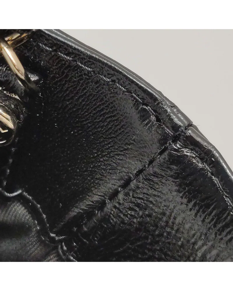 Chanel 31 Bag Nano, close up light wear on the lining