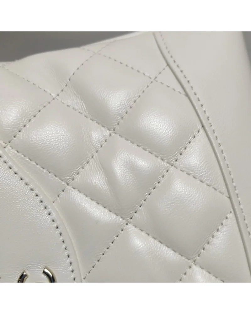 Chanel 31 Bag Nano, close up light wrinkles on the body and the front