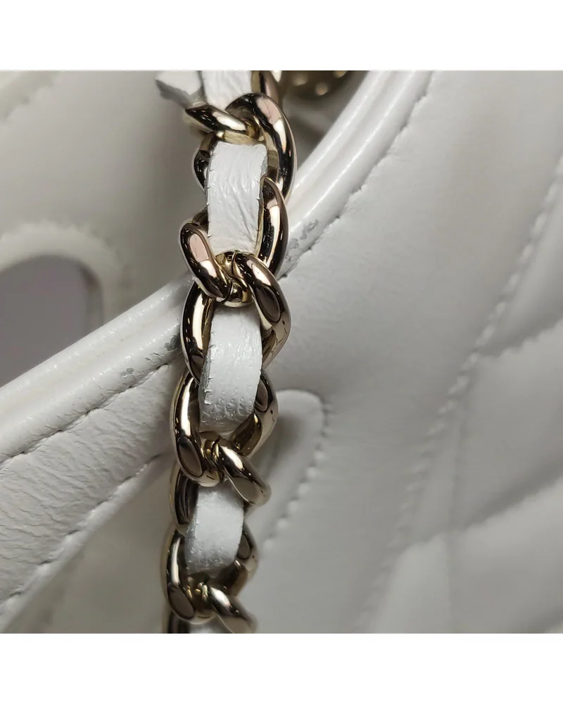 Chanel 31 Bag Nano, close up light wear on the strap
