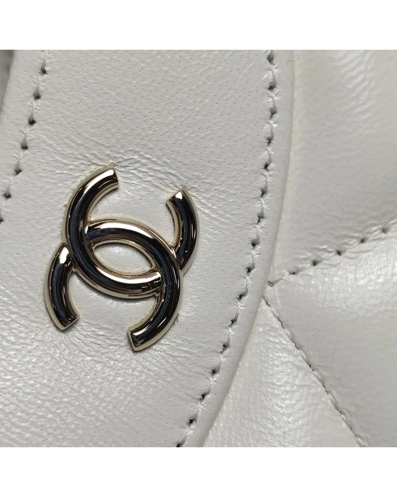 Chanel 31 Bag Nano, close up light wear on the hardware