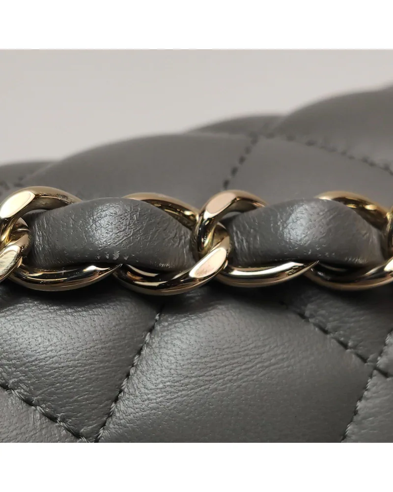 Chanel Classic Flap Large Mini, close up light wear on the strap