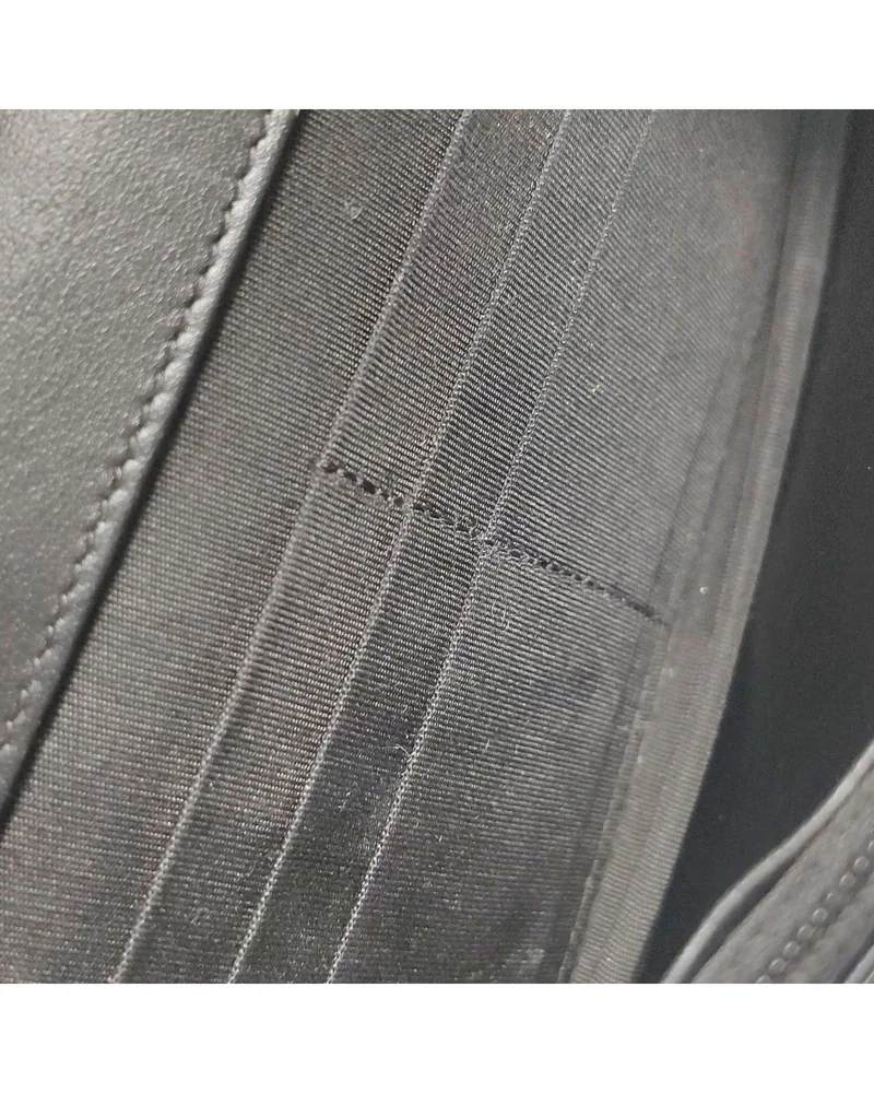 Chanel Boy Wallet on Chain, close up light marks on the lining
