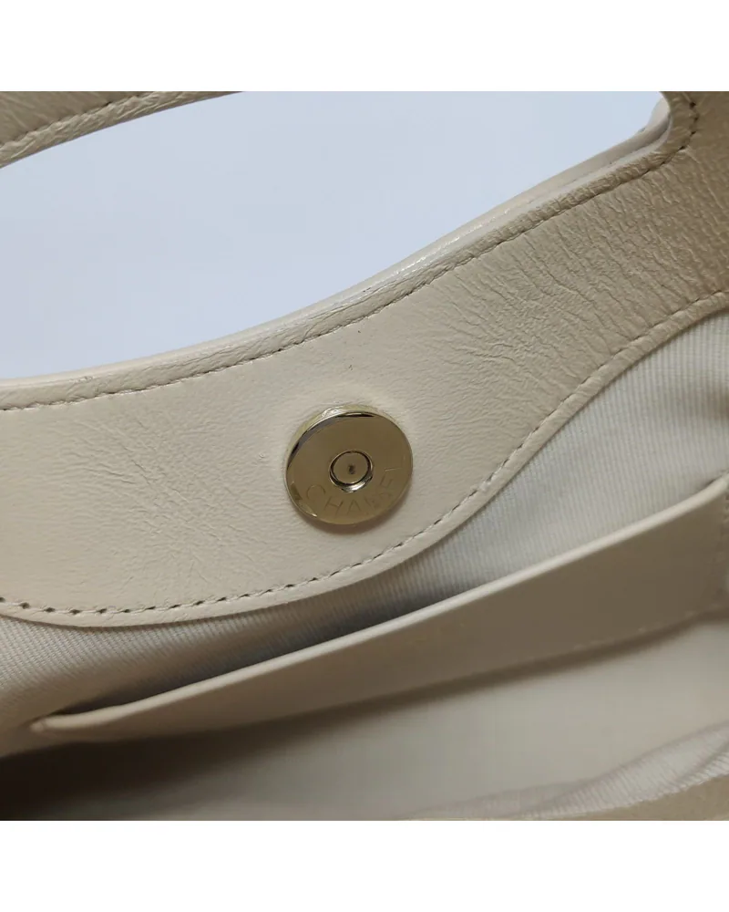 Chanel 31 Bag Nano, close up light wear on the hardware