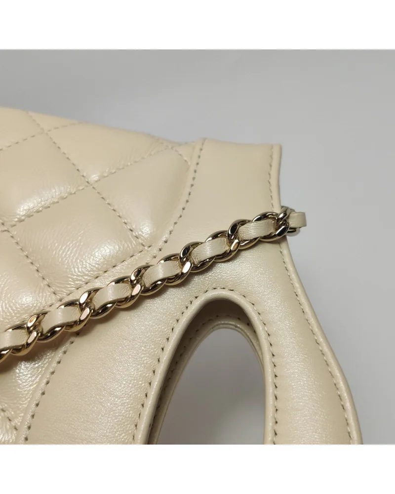 Chanel 31 Bag Nano, close up light wear on the hardware