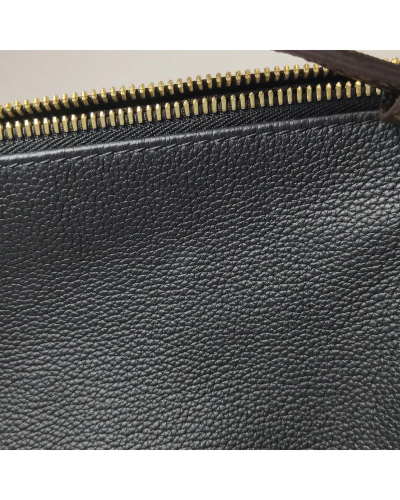 Louis Vuitton Express PM, close up light marks on the body and the front