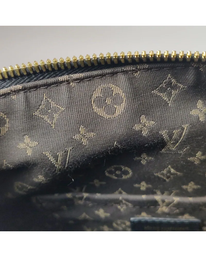 Louis Vuitton Express PM, close up light marks on the lining