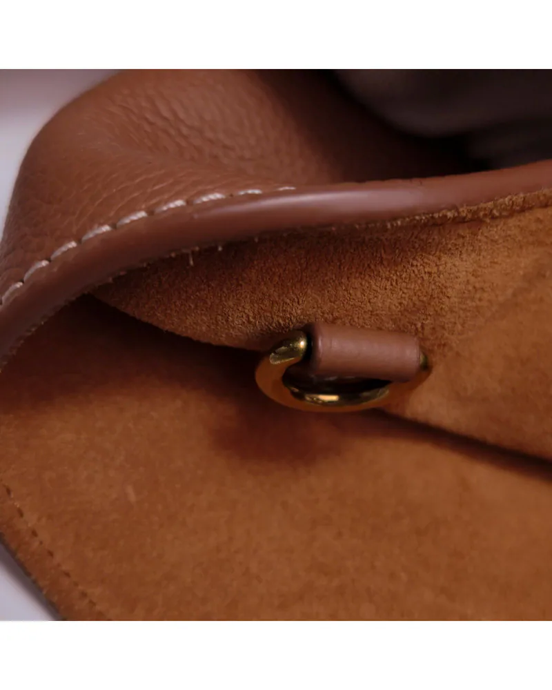 Louis Vuitton Low Key Medium, close up light wear on the hardware