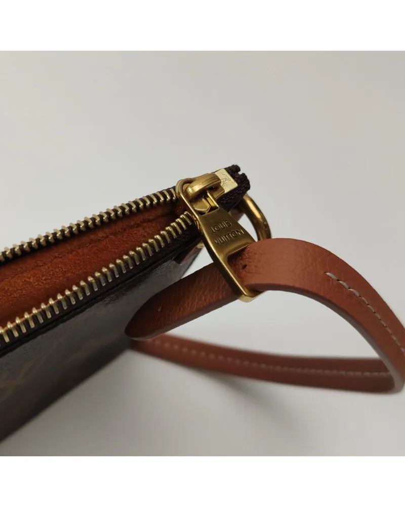 Louis Vuitton Low Key Medium, close up light wear on the hardware
