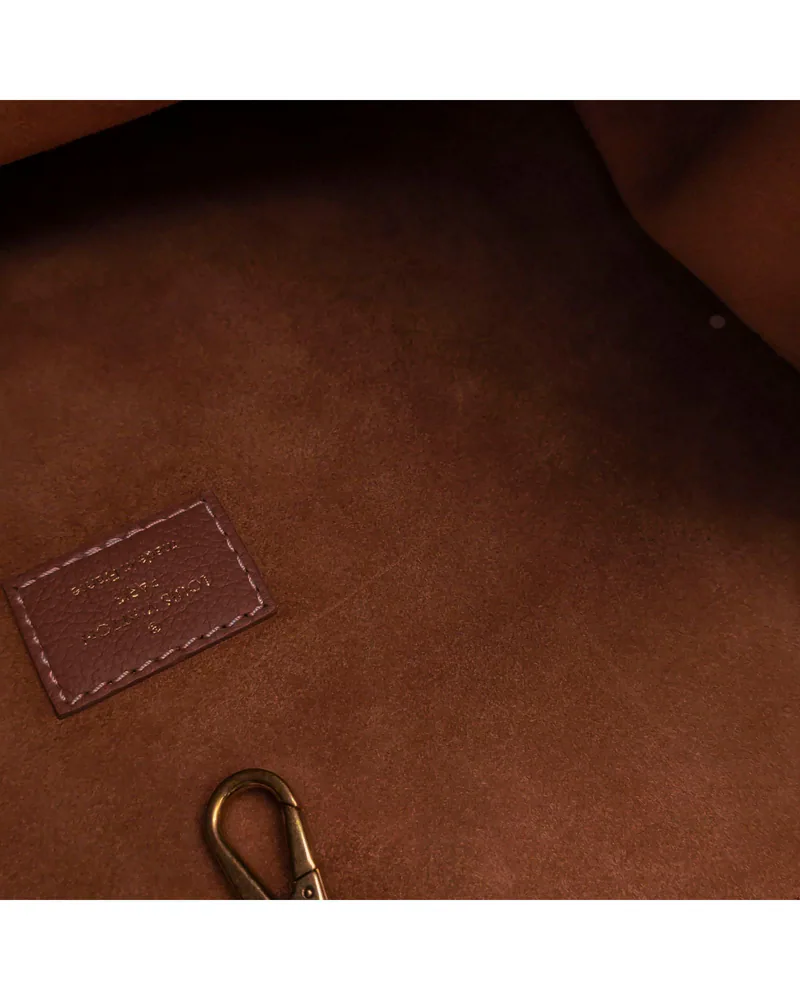 Louis Vuitton Low Key Medium, close up light scratches on the lining