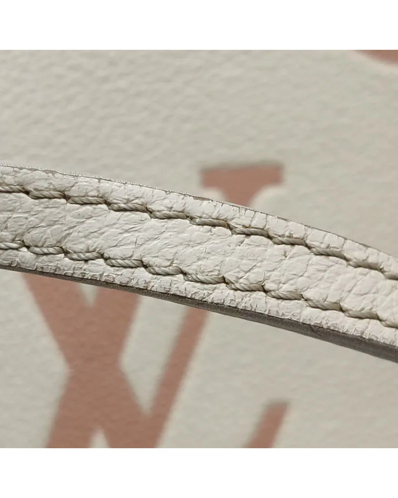 Louis Vuitton Neverfull MM, Giant Monogram, close up light wear on the strap