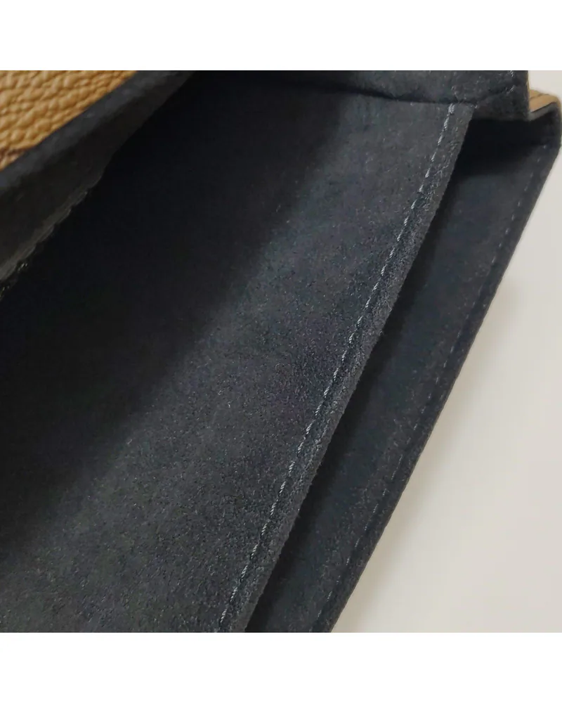 Louis Vuitton Pochette Métis MM, Reverse, close up light marks on the lining