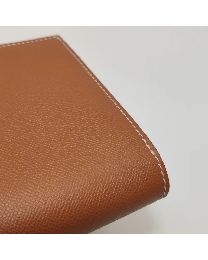 Hermès Kelly Pocket, close up light marks on the body and the back
