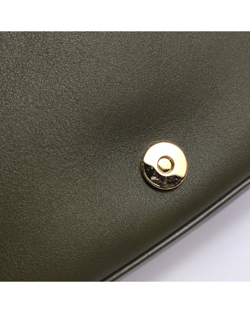 Gucci Blondie Medium, close up light wear on the hardware