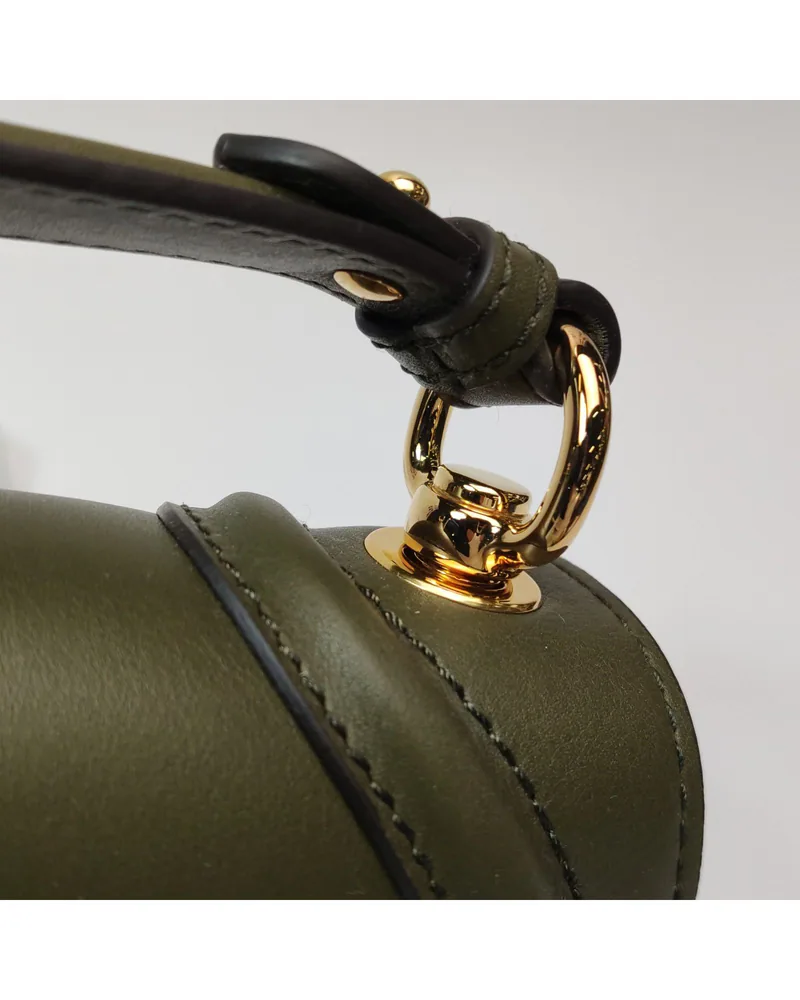 Gucci Blondie Medium, close up light wear on the hardware