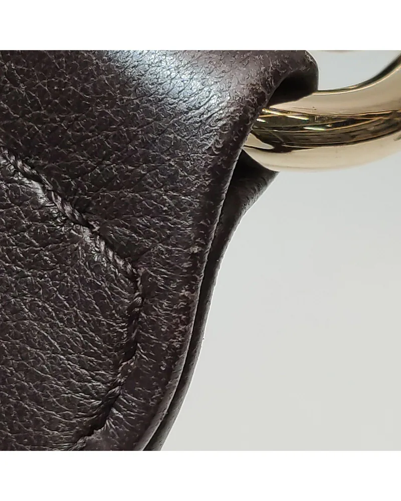 Gucci Jackie 1961, close up light wear on the strap