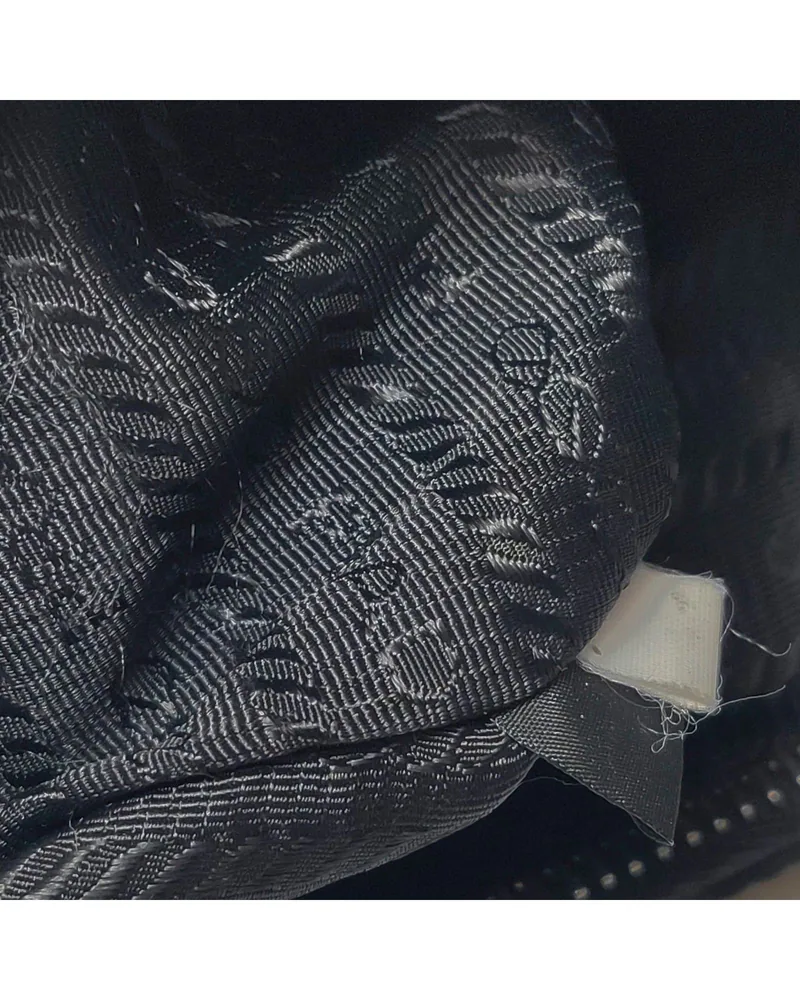 Prada Re-Edition Mini, close up light wear on the lining