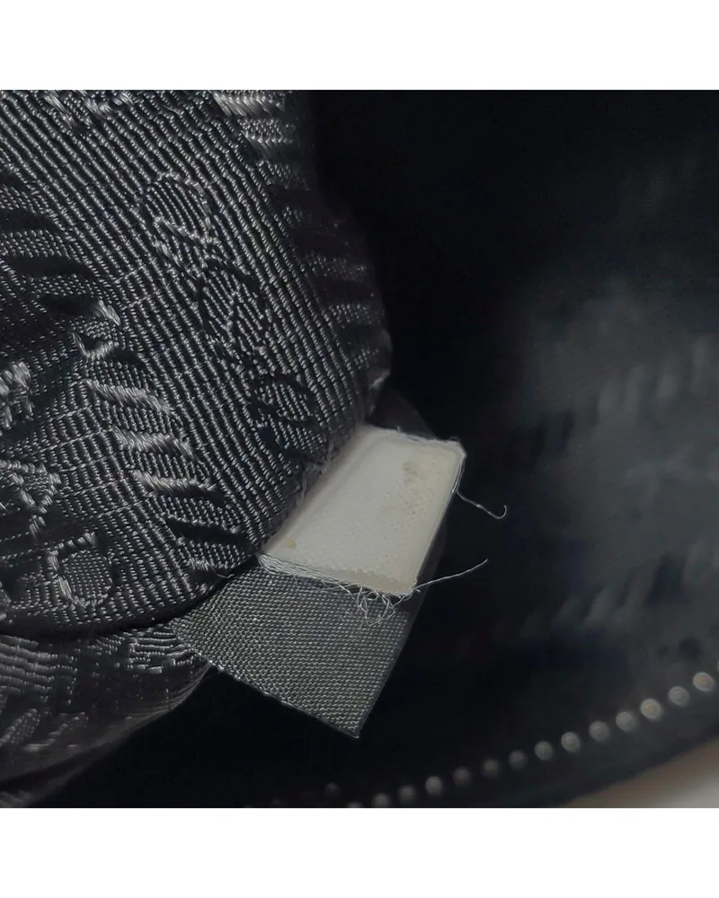 Prada Re-Edition Mini, close up light marks on the lining