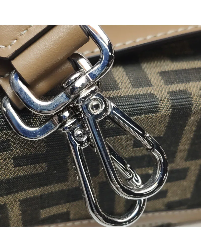 Fendi Baguette Trunk, close up light wear on the hardware
