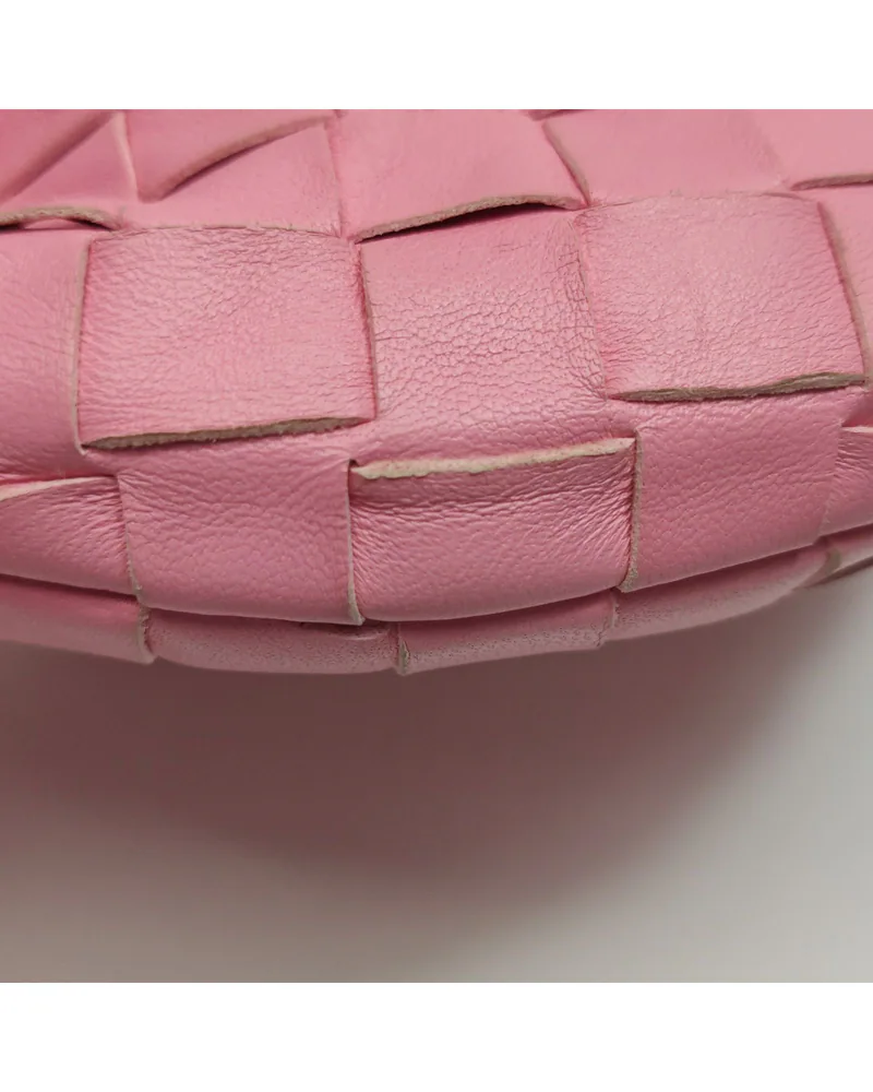 Bottega Veneta Mini Jodie, close up light wear on the body