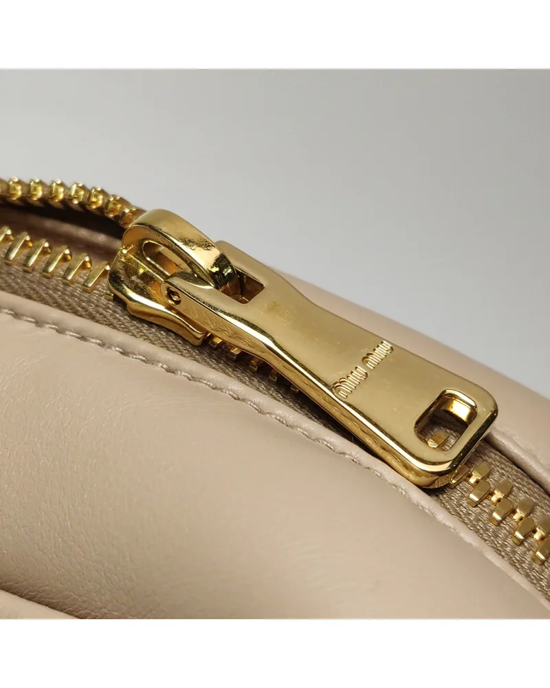 Miu Miu Arcadie Large, close up light wear on the hardware