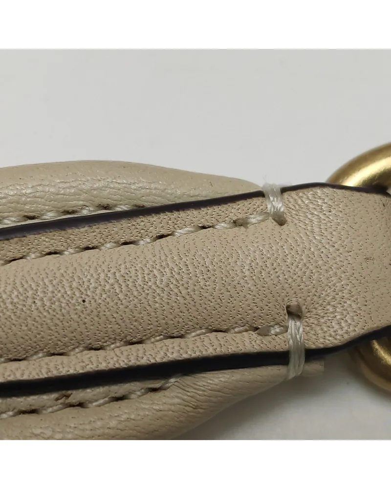 Coach Tabby, close up light marks on the strap