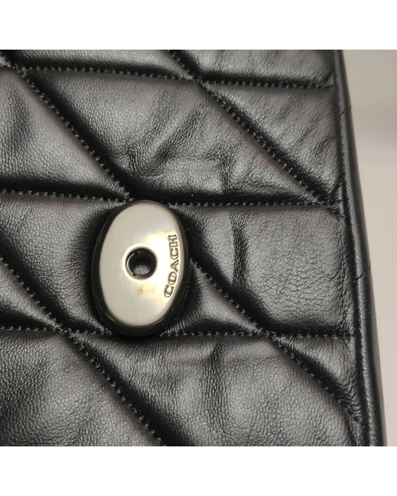 Coach Tabby 33, Quilted, close up light pressure marks on the body and the front